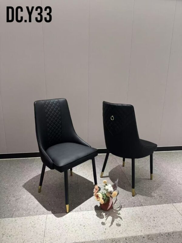 Noir Luxe Dining Chair — All-Black Quilted Leather Chair with Gold Ring Back Detail & Black Gold-Tipped Legs | Bold Dining & Accent Chair UAE